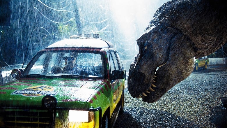 Screen cap from the film Jurassic Park. A Tyrannosaurus Rex leans close to peer inside the windows of a Jeep.