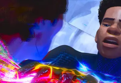 A screenshot from Spider-Man: Across the Spider-Verse. Miguel O'Hara has pounced on top of Miles Morales. Miles looks up at him and says "Nah, imma do my own thing."